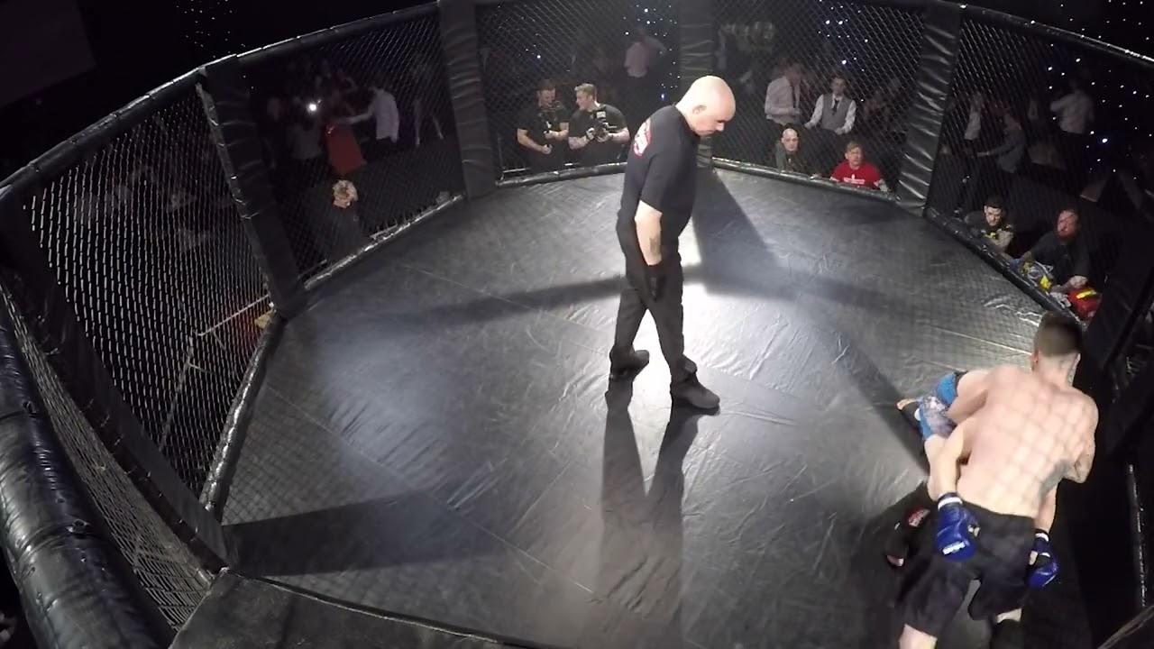 Ultra MMA | Norwich | Oisin The Honey Badger Burke V The Red Rage Conner Page background