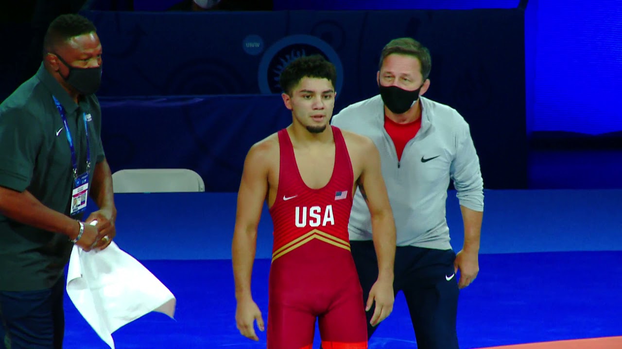 Qual. FS - 57 kg: R. FIGUEROA II (USA) v. A. GHOLI ZADEGA (IRI) background