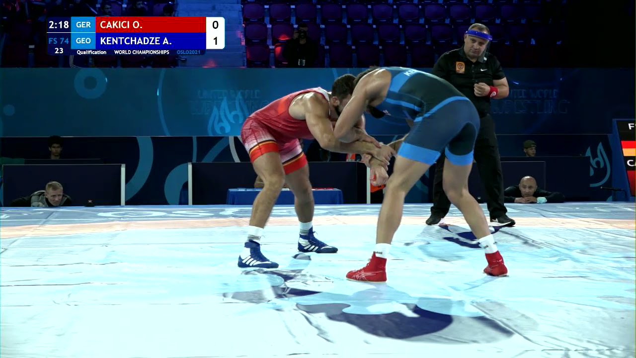 Qual. FS - 74 kg: O. CAKICI (GER) v. A. KENTCHADZE (GEO) background