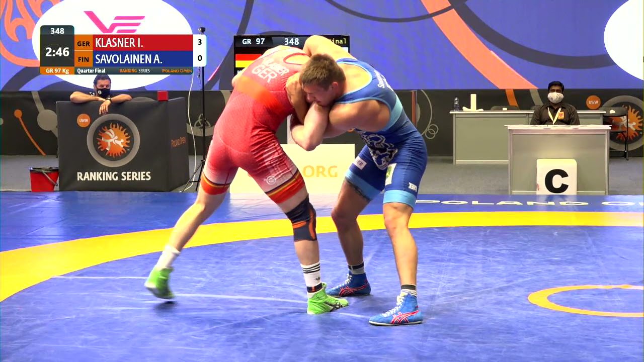 1/4 GR - 97 kg: I. KLASNER (GER) v. A. SAVOLAINEN (FIN) background