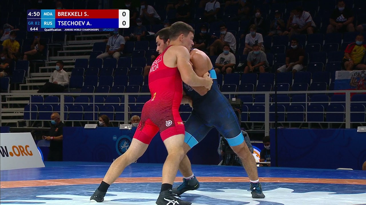 Qual. GR - 82 kg: S. BREKKELI (MDA) v. A. TSECHOEV (RUS) background