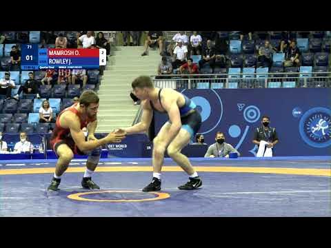 1/4 FS - 80 kg: O. MAMROSH (UKR) v. J. ROWLEY (USA) background