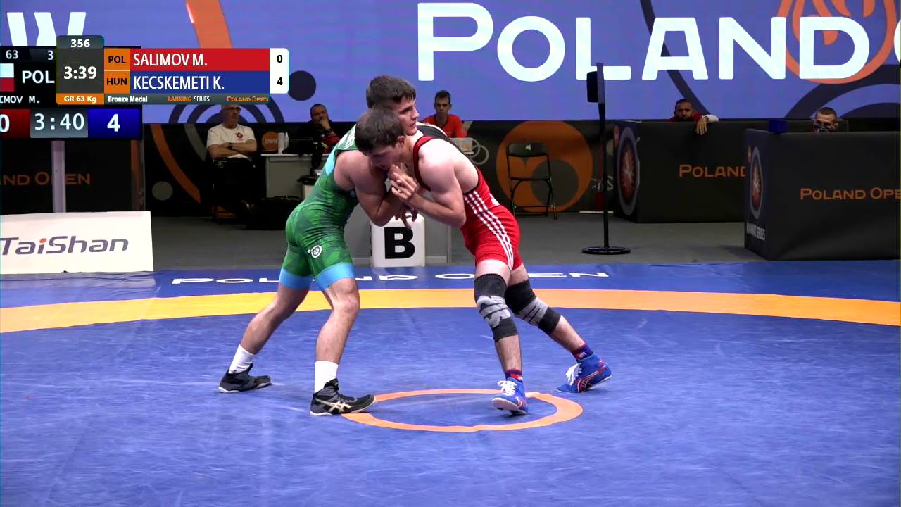 BRONZE GR - 63 kg: M. SALIMOV (POL) v. K. KECSKEMETI (HUN) backdrop