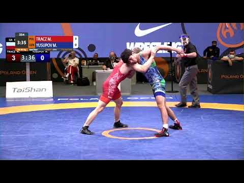 1/2 GR - 60 kg: M. TRACZ (POL) v. M. YUSUPOV (UZB) background