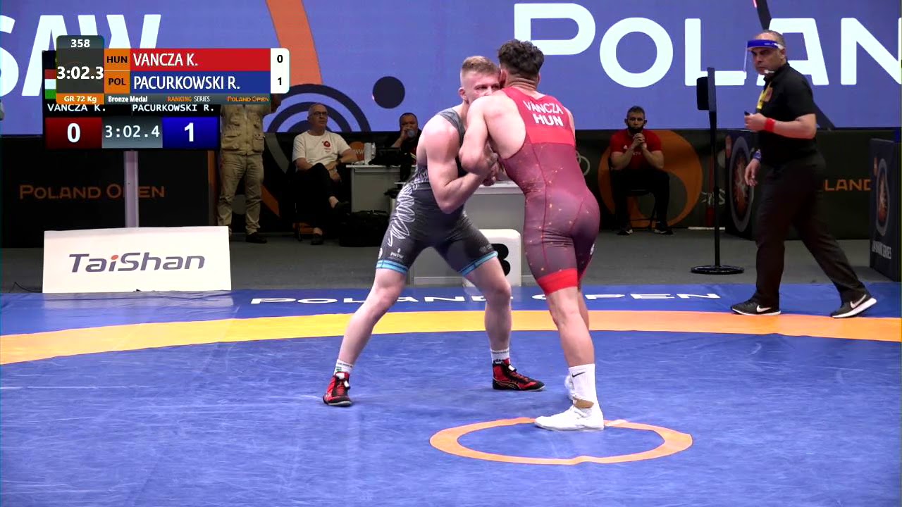 BRONZE GR - 72 kg: K. VANCZA (HUN) v. R. PACURKOWSKI (POL) background