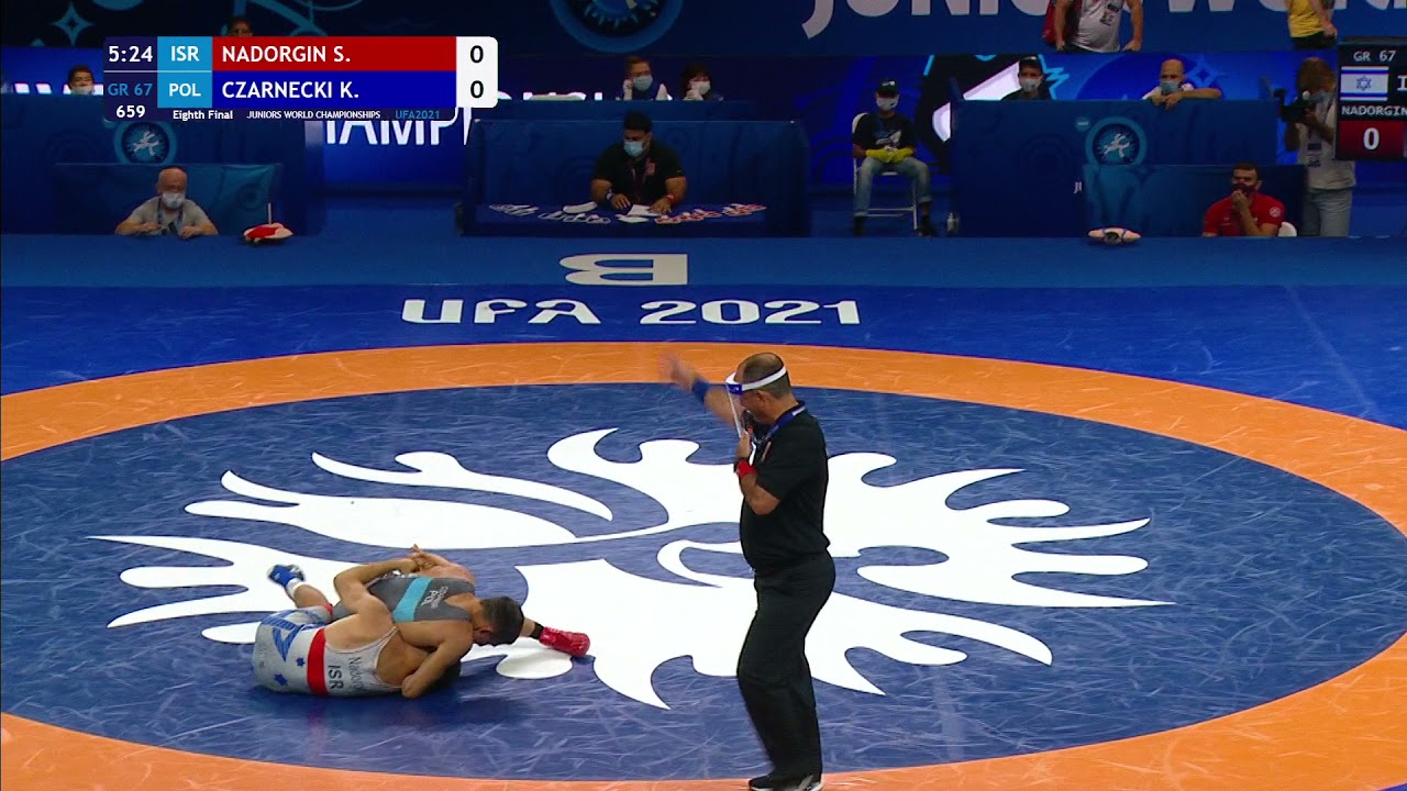 1/8 GR - 67 kg: S. NADORGIN (ISR) v. K. CZARNECKI (POL) background
