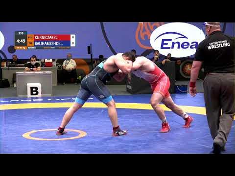 1/2 GR - 97 kg: G. KURNICZAK (POL) v. M. BALIHAMZEHDE (IRI) background
