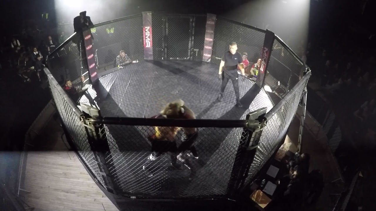 Fight 1 UMMA Rhys The Butcher Bowman V Callum Taylor background