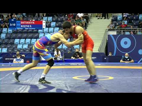 1/8 FS - 55 kg: M. BAITUKAEV (RUS) v. B. BOEJTHE (ROU) background