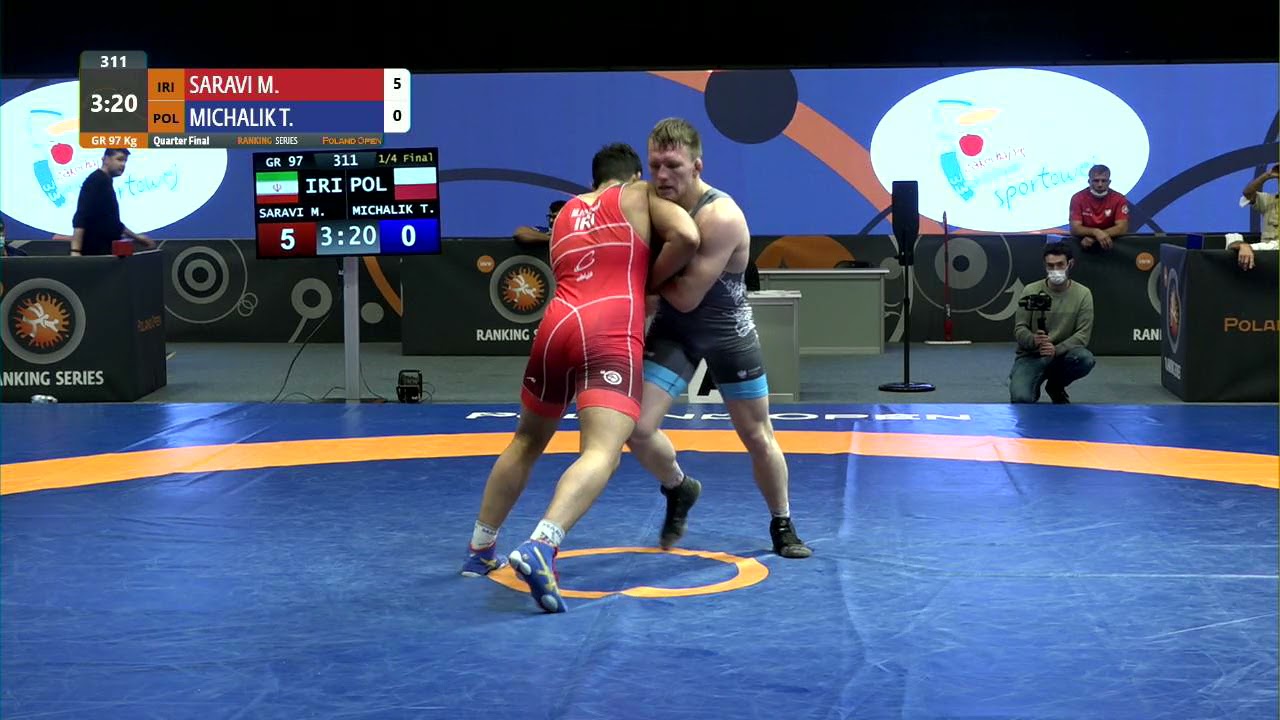 1/4 GR - 97 kg: M. SARAVI (IRI) v. T. MICHALIK (POL) background