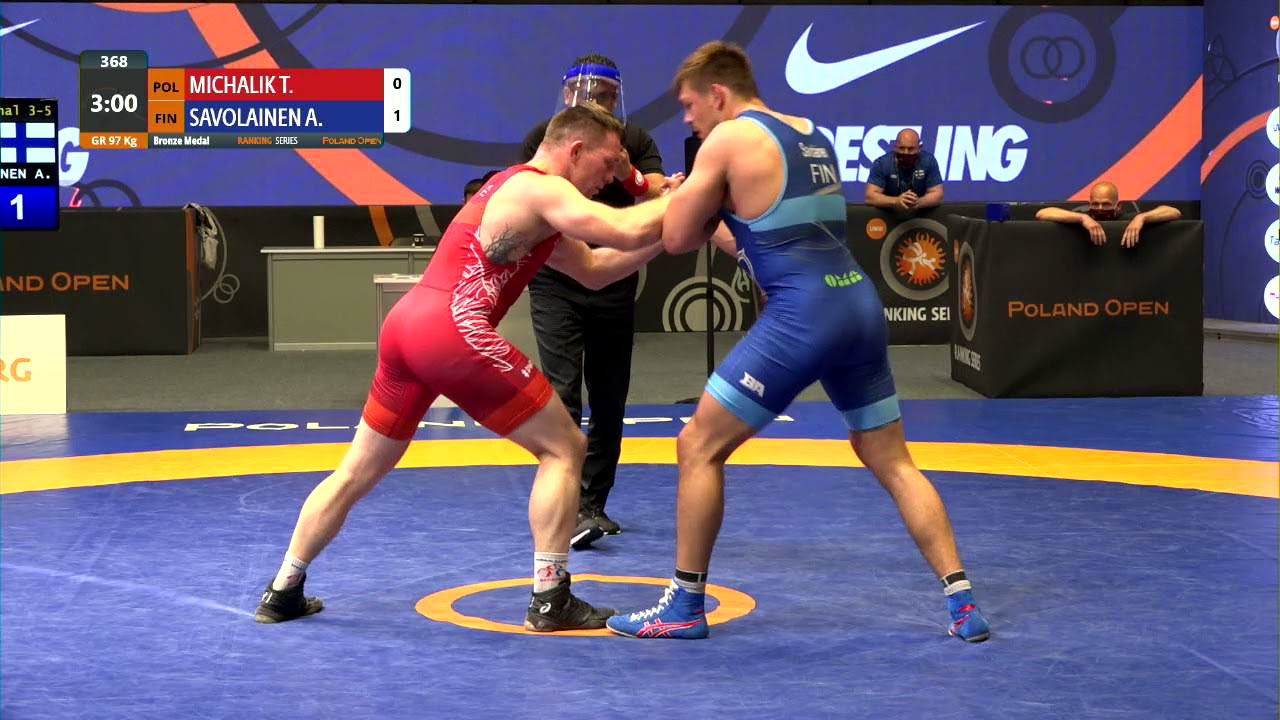 BRONZE GR - 97 kg: T. MICHALIK (POL) v. A. SAVOLAINEN (FIN) background