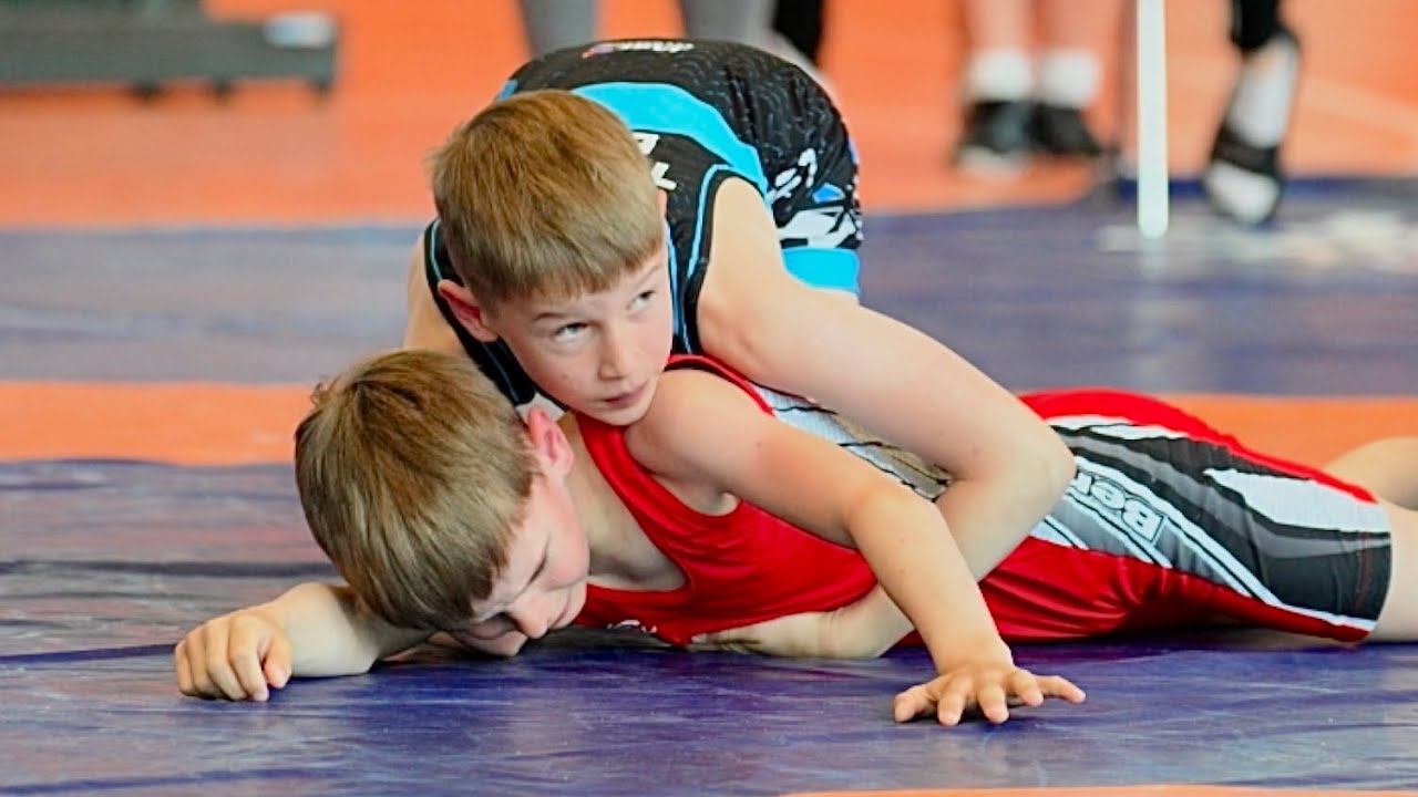 U11 J. Jürimäe (EST) vs L. Toom (EST). Greco-roman 29kg youth wrestling Estonia. background