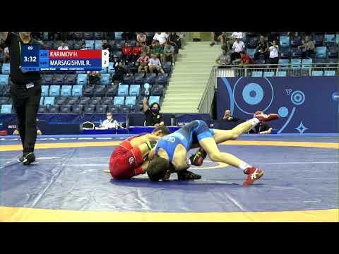 1/4 FS - 48 kg: H. KARIMOV (AZE) v. R. MARSAGISHVIL (GEO) background