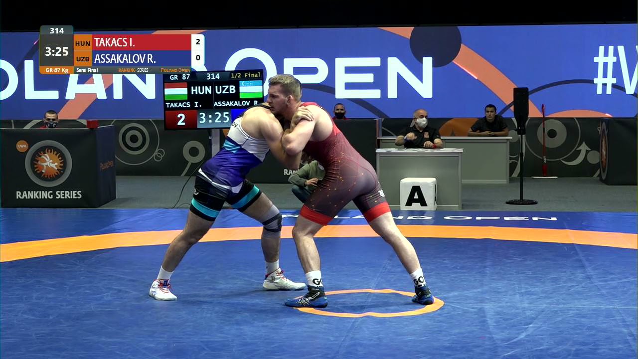 1/2 GR - 87 kg: I. TAKACS (HUN) v. R. ASSAKALOV (UZB) background