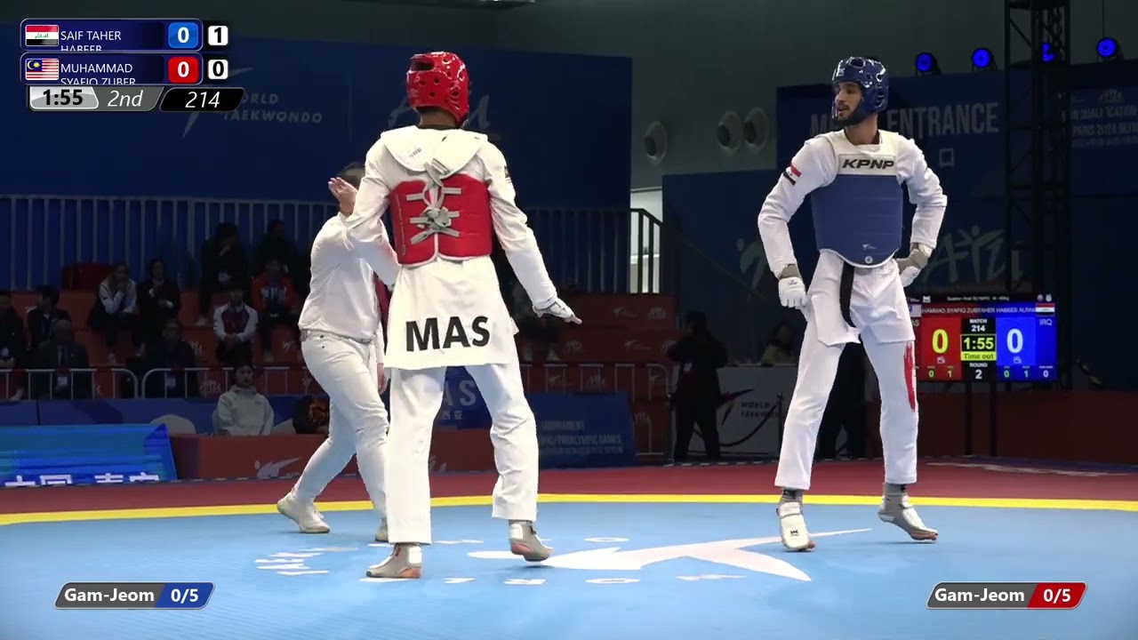 214 Quarter final M 80kg IRQ SAIF TAHER HABEEB ALRAMMAHI MAS MUHAMMAD SYAFIQ ZUBER background