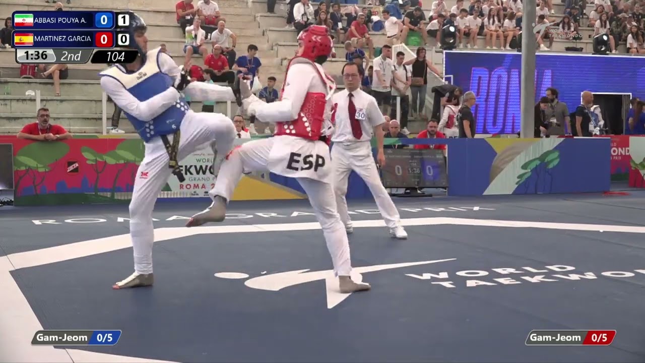 104 Round of 32 MEN M +80KG IRI ABBASI POUYA A ESP MARTINEZ GARCIA