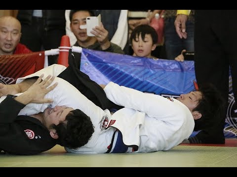 Masato Uchishiba vs Takuwa Yukawa 内柴正人vs湯川拓摩 background