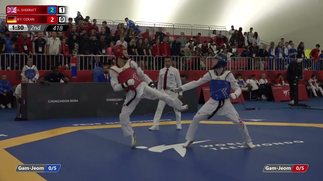 418 Round of 32 Men 51kg GBR A SHERRATT GER B Y OZKAN background