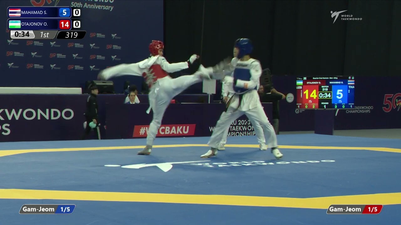 319 Quarter final Men 54kg THA MAHAMAD S UZB OTAJONOV O