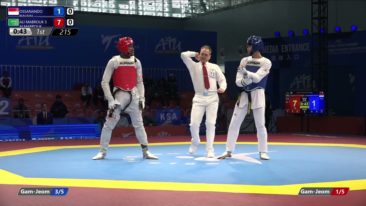215 Quarter final M 80kg INA OSSANANDO NAUVAL KSA ALI MABROUK S ALMABROUK background