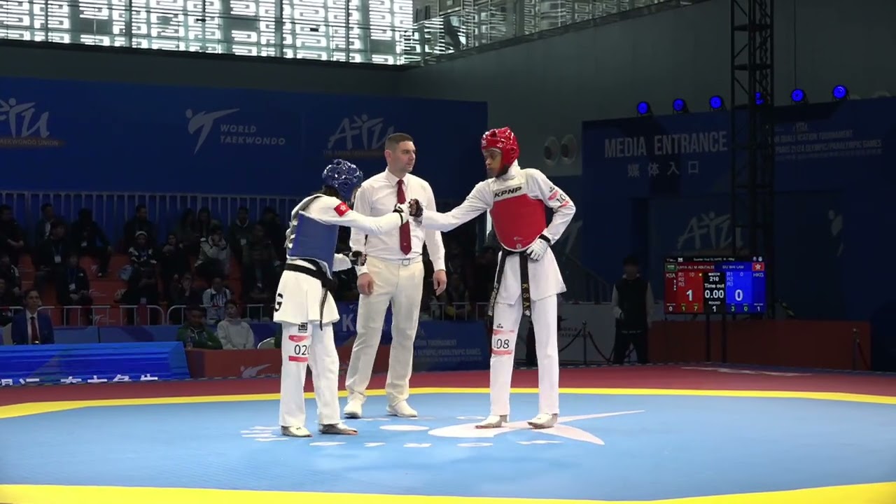 210 Quarter final W 49kg HKG SIU WAI LAM KSA DUNYA ALI M ABUTALEB background