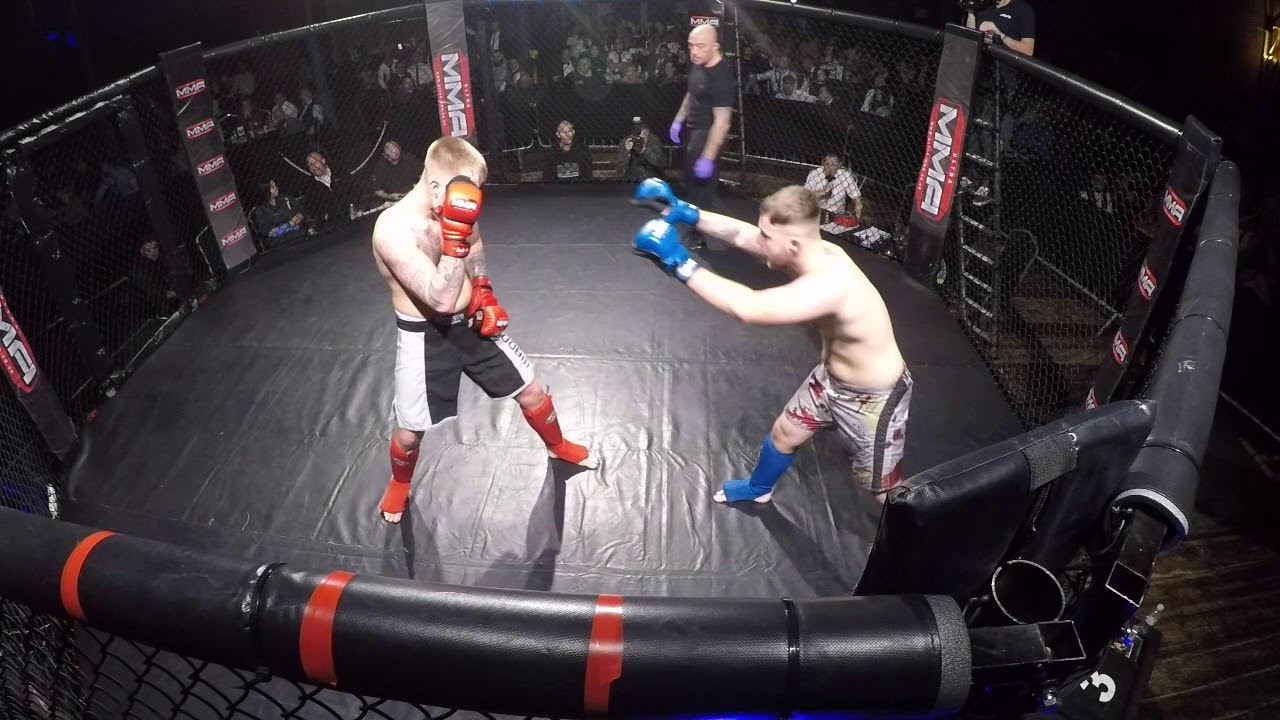 Ultra MMA | Derby | Tristan Bates VS Mitchell Cotton background