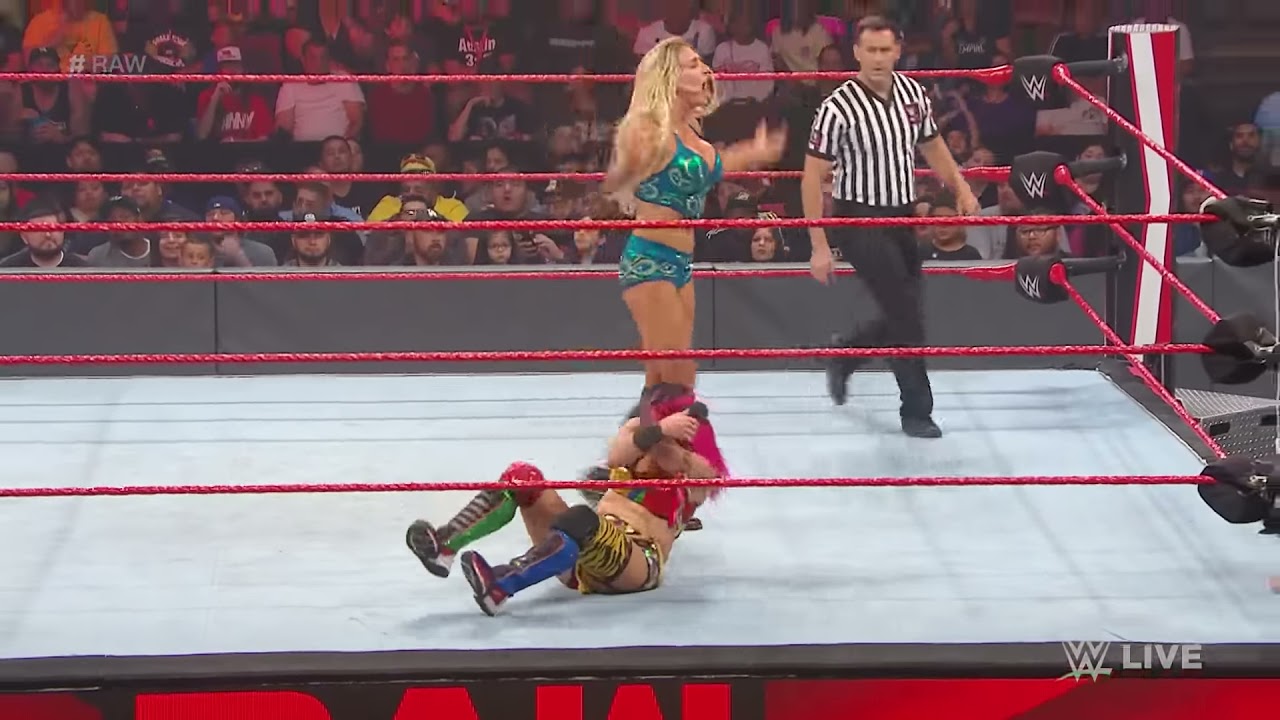 The Kabuki Warriors vs. Charlotte Flair & Becky Lynch: Raw, October 07, 2019 background