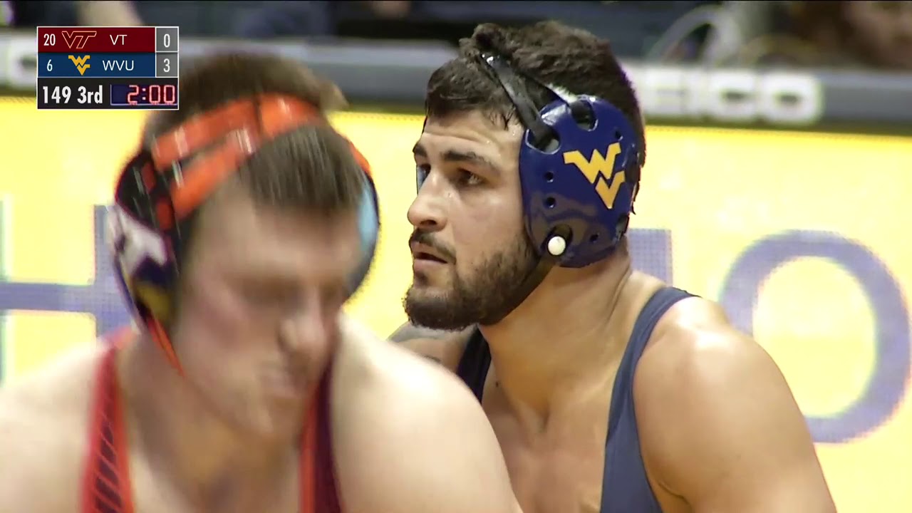 149lbs Christian Monserrat WVU dec Ryan Blees VT background