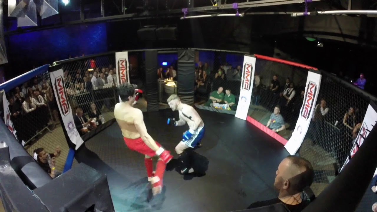 Ultra MMA | Plymouth | Jason Van Der Schouw VS Ollie Baker background