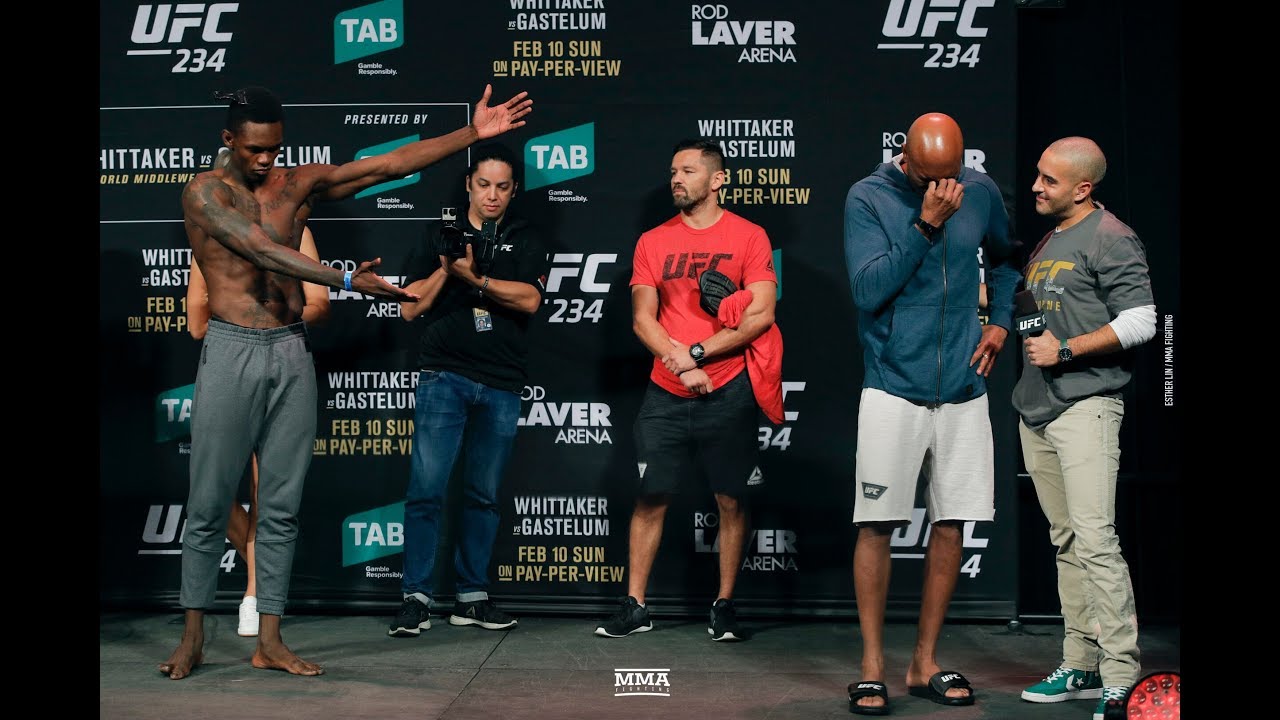 UFC 234: Anderson Silva Breaks Into Tears After Israel Adesanya Weigh-In Staredown background