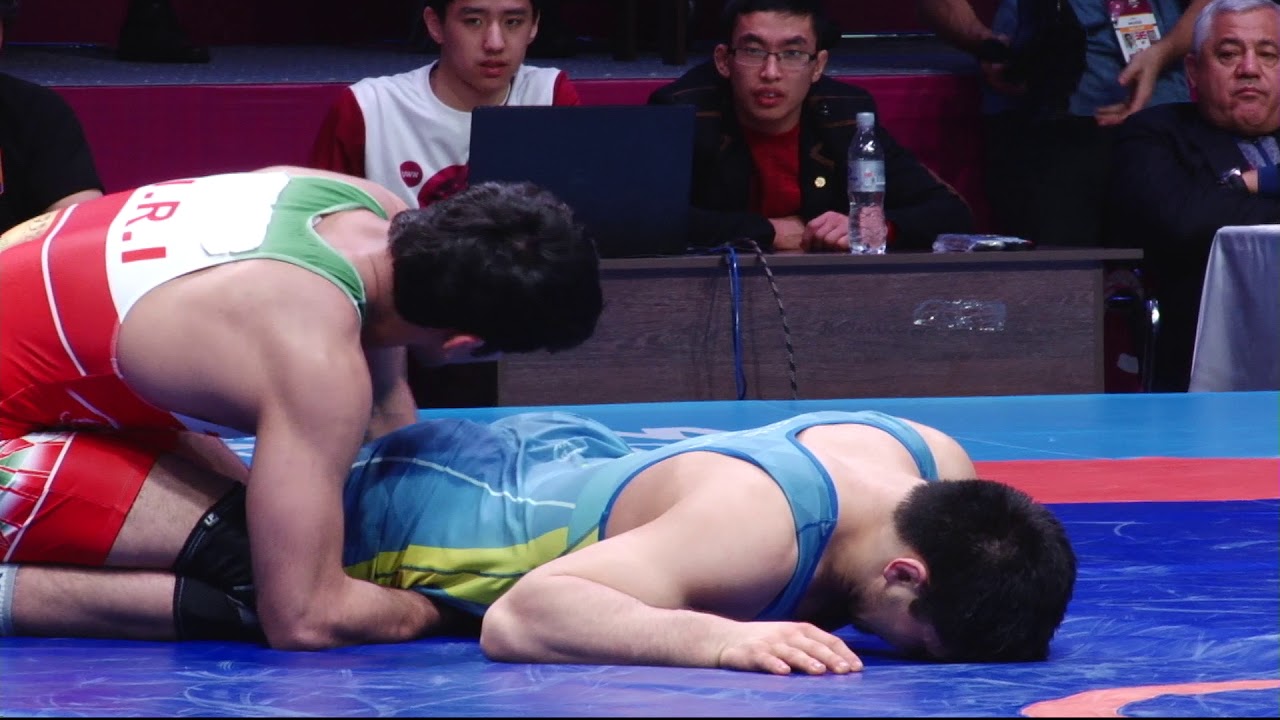 1/4 FS - 86 kg: Hassan YAZDANI (IRI) v. A. DAULETBEKOV (KAZ) background