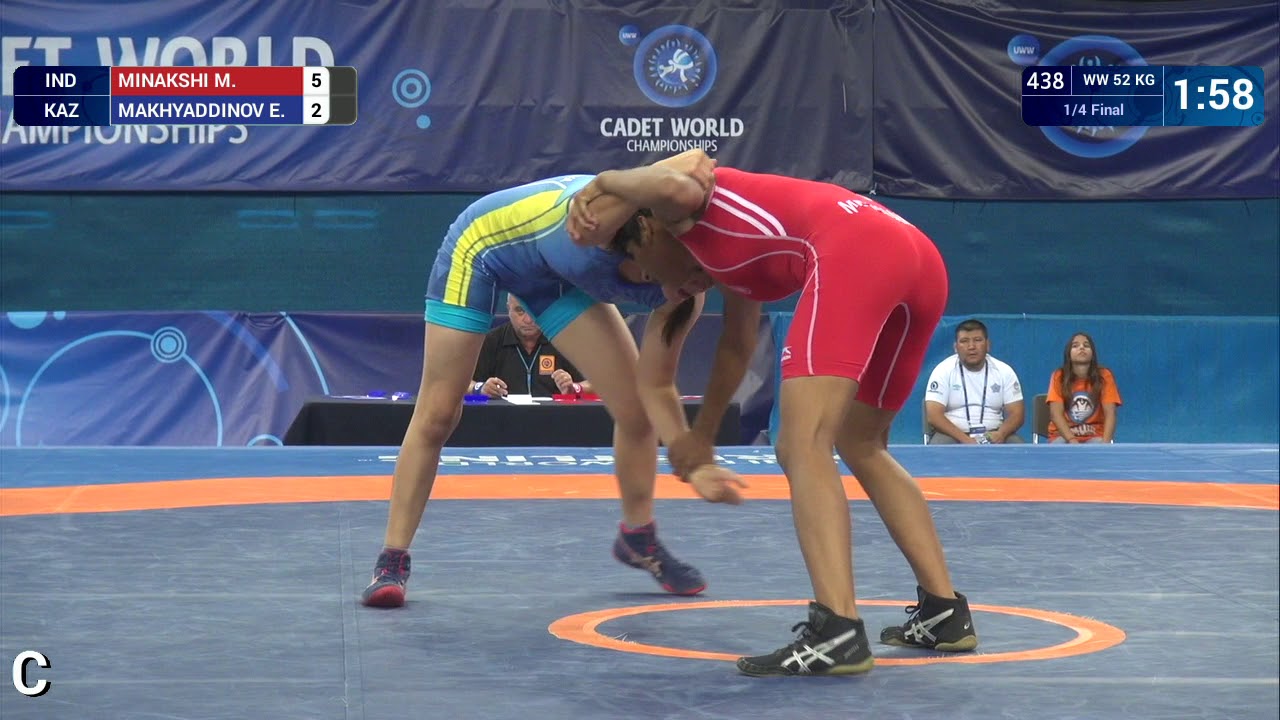 1/4 WW - 52 kg: M. MINAKSHI (IND) df. E. MAKHYADDINOV (KAZ) by VPO1, 7-2 background