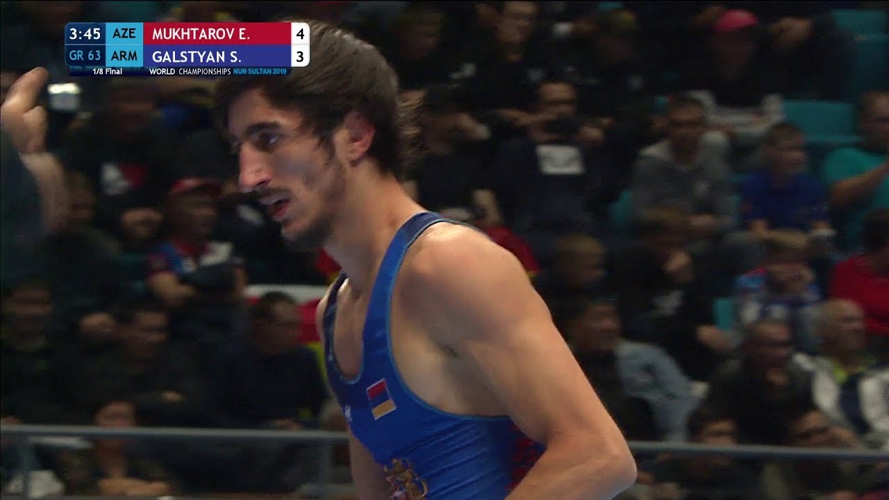 1/8 GR - 63 kg: E. MUKHTAROV (AZE) v. S. GALSTYAN (ARM) background