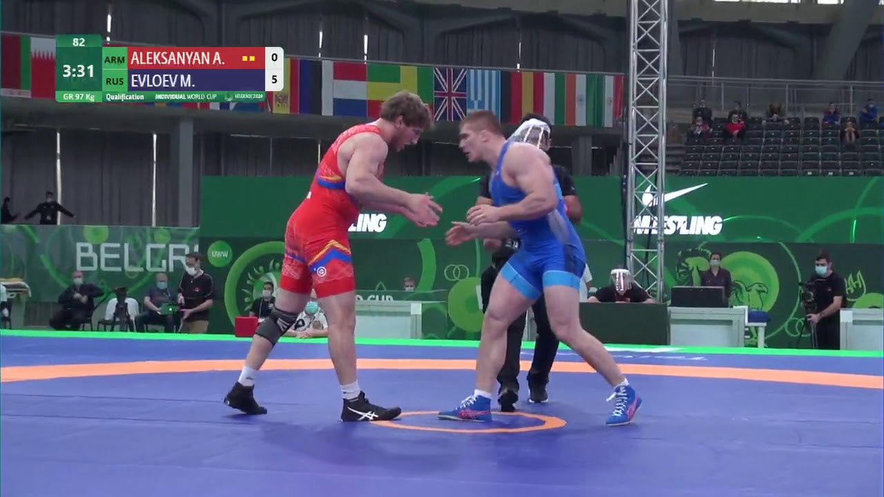 Qual. GR - 97 kg: A. ALEKSANYAN (ARM) v. M. EVLOEV (RUS) background