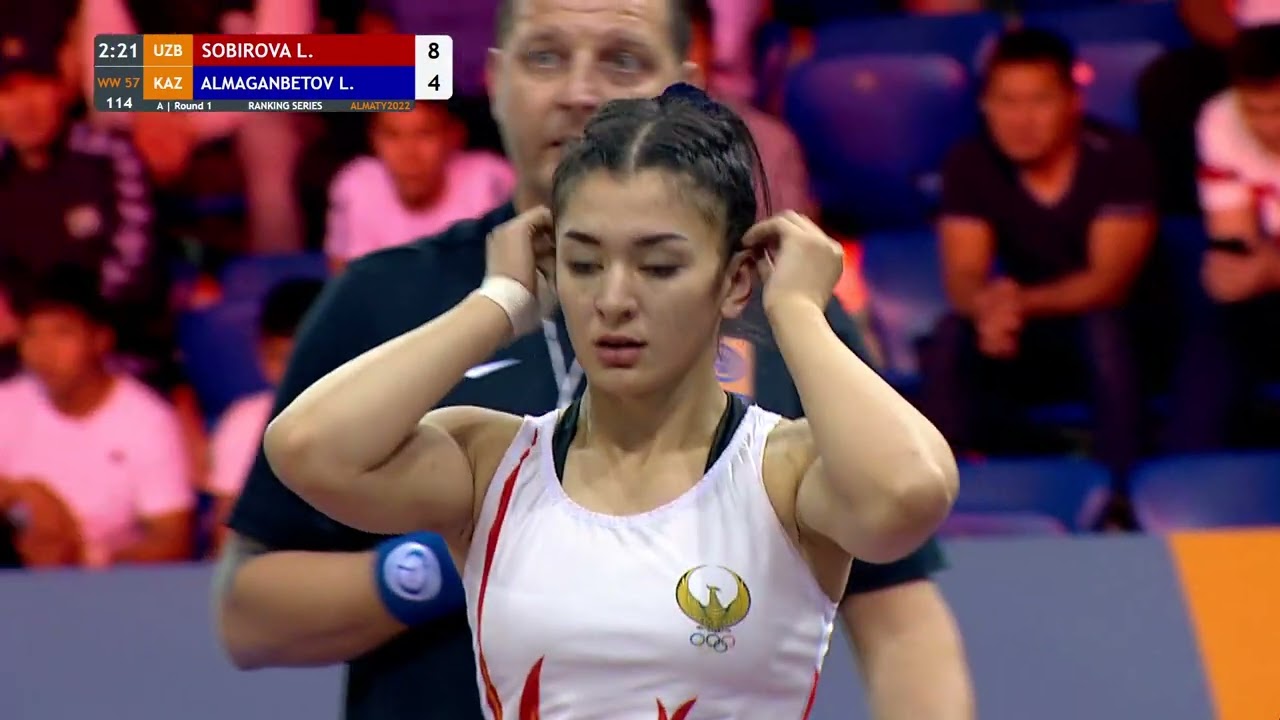 Round 1 WW - 57 kg: L. SOBIROVA (UZB) v. L. ALMAGANBETOV (KAZ) background