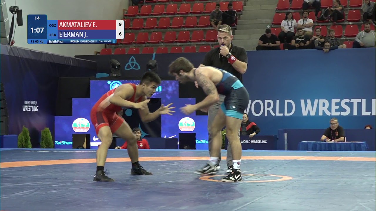 1/8 FS - 65 kg: E. AKMATALIEV (KGZ) v. J. EIERMAN (USA) background