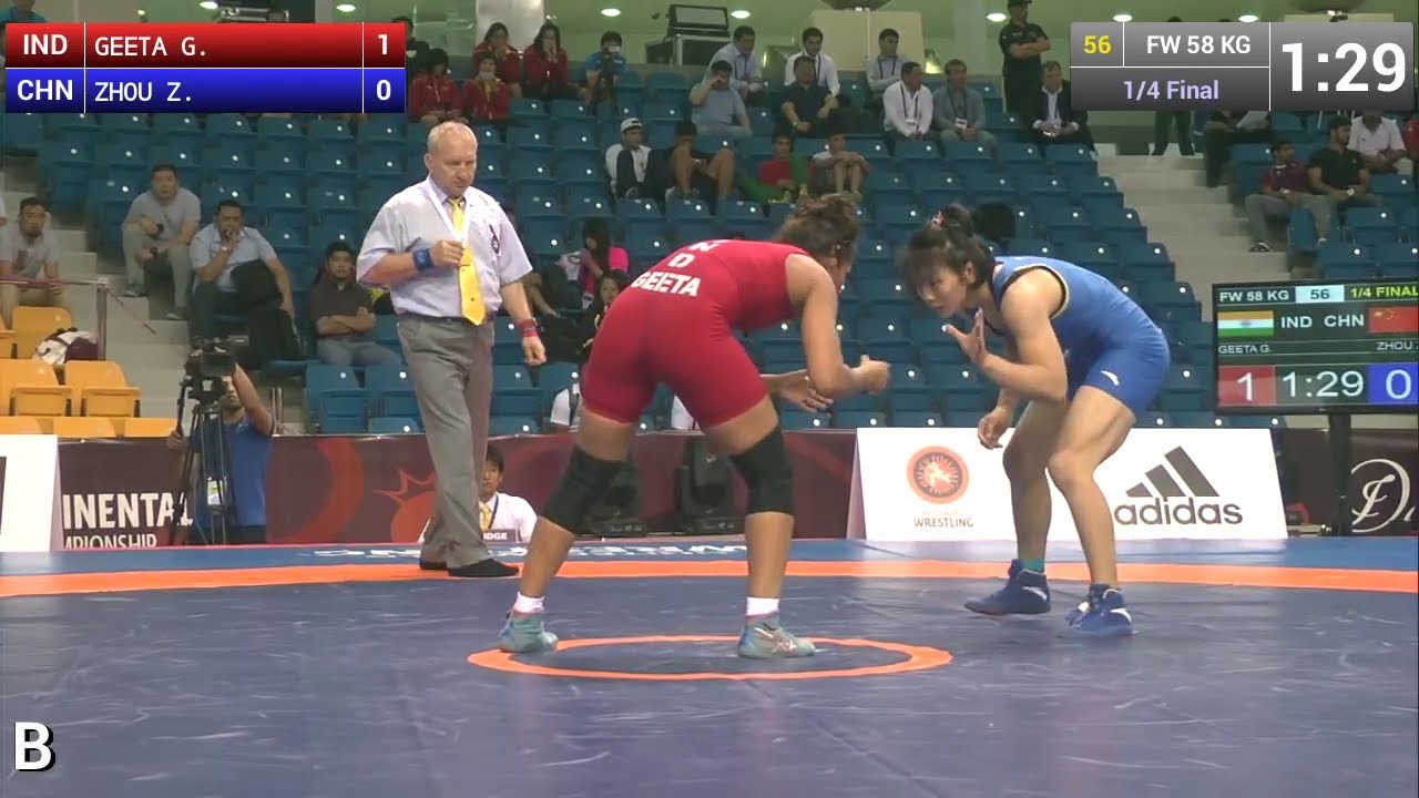 G. GEETA (IND) df. Z. ZHOU (CHN) | FW 58 kg | 1/4 background