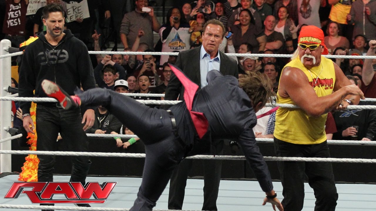 Arnold Schwarzenegger and Joe Manganiello join Hulk Hogan in the ring: Raw, March 24, 2014 background