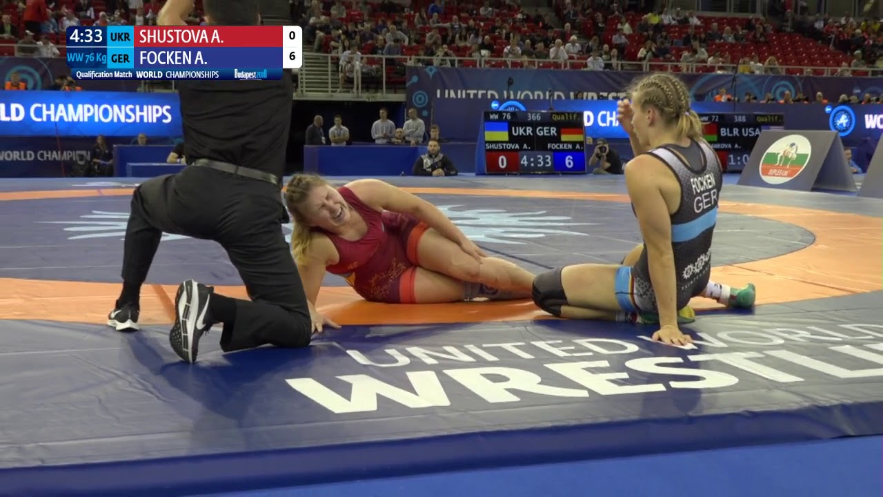 Qual. WW - 76 kg: A. SHUSTOVA (UKR) v. A. FOCKEN (GER) background
