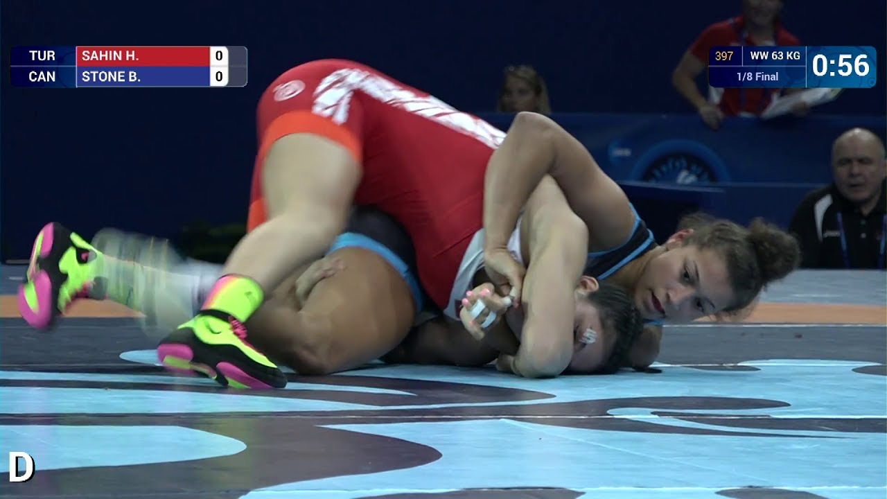 1/8 WW - 63 kg: H. SAHIN (TUR) df. B. STONE (CAN) by VFA, 4-4 background