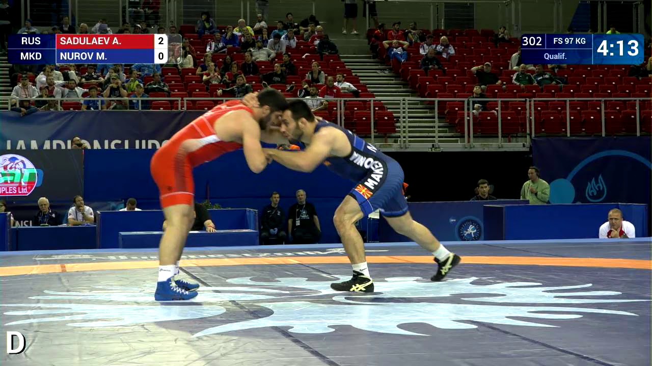 Qual. FS - 97 kg: A. SADULAEV (RUS) v. M. NUROV (MKD) background