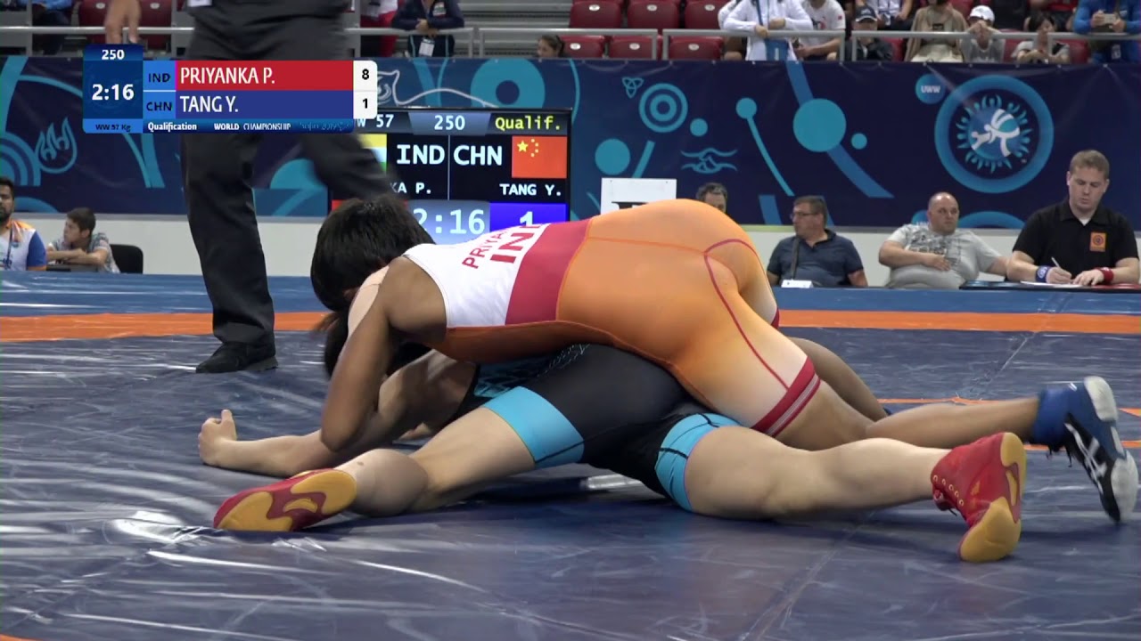 Qual. WW - 57 kg: P. PRIYANKA (IND) v. Y. TANG (CHN) background
