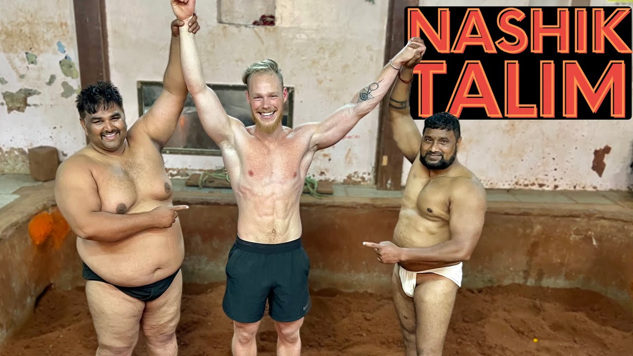 Foreigner Tries Indian MUD Wrestling backdrop