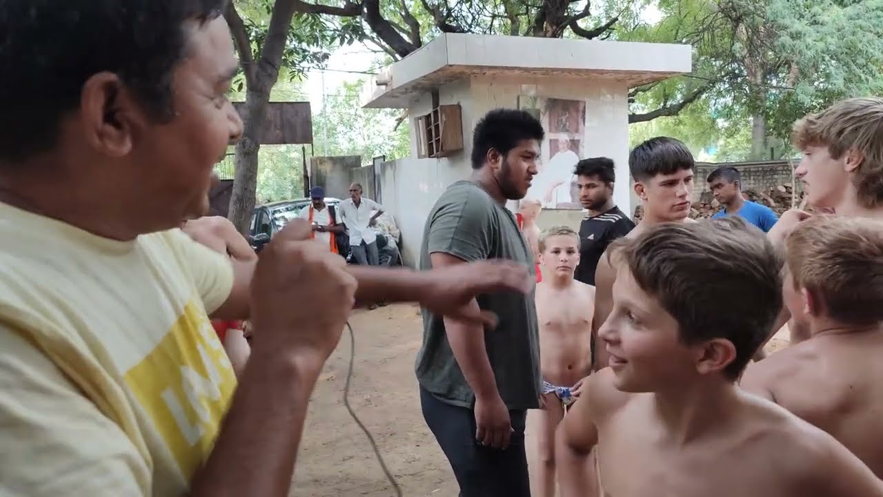 Colin from US: a Talk with the Students from the Wrestling Contingent from USA background