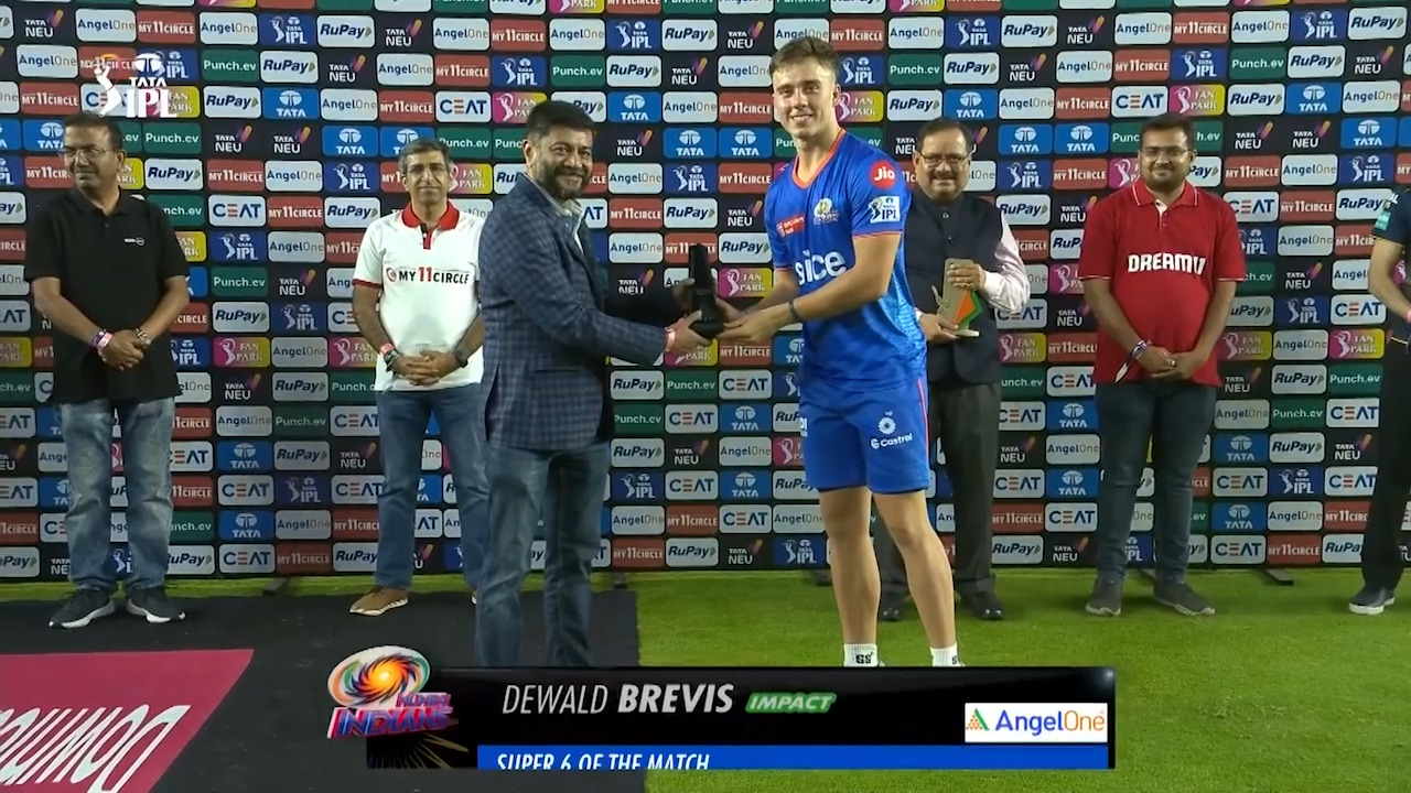 M05: GT vs MI – AngelOne Super 6 of the Match – Dewald Brevis background