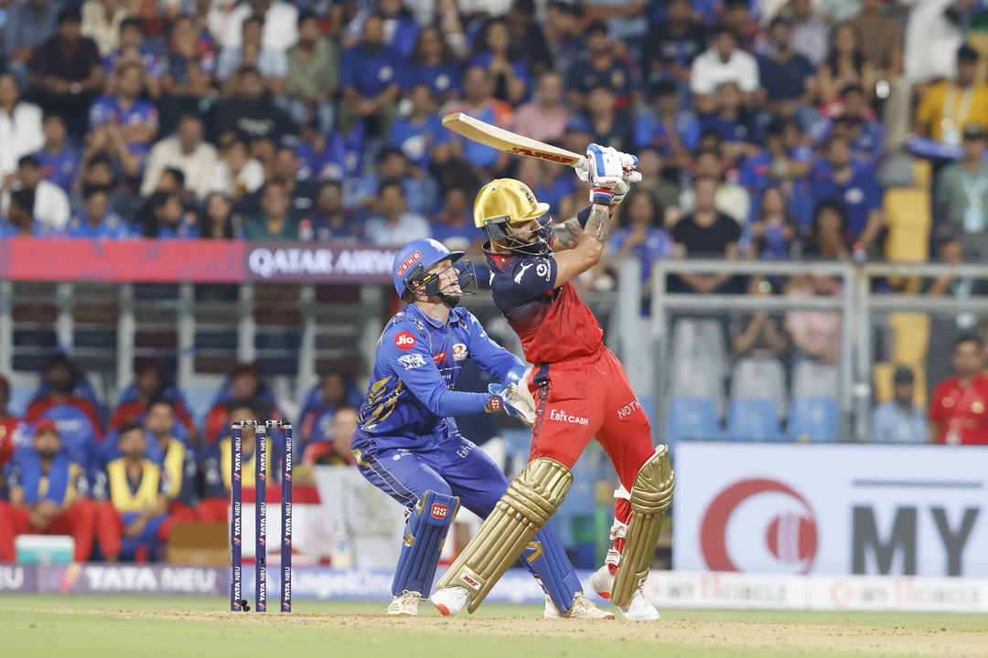 Fifty up in style: Kohli on fire at Wankhede background