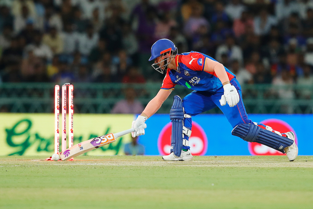 Rolls back onto the stumps! Warner's bizarre dismissal