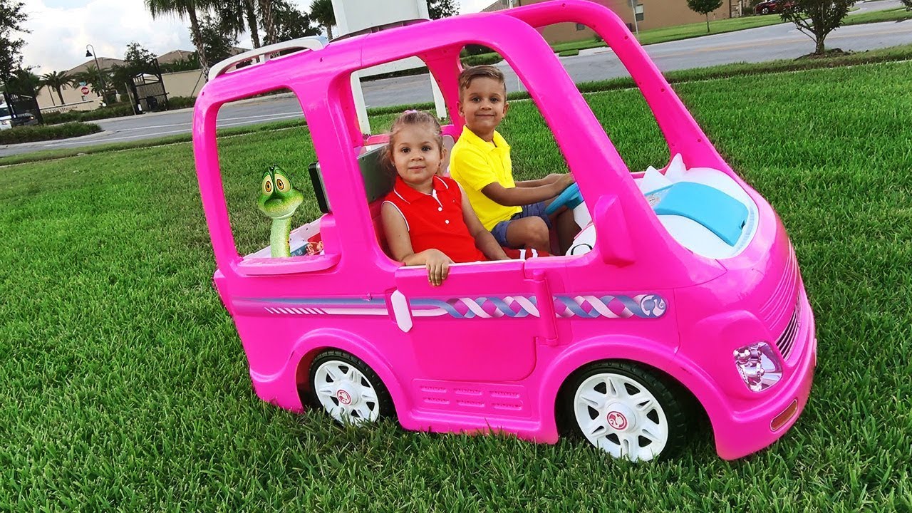 Diana and her Barbie car - Camping adventure background