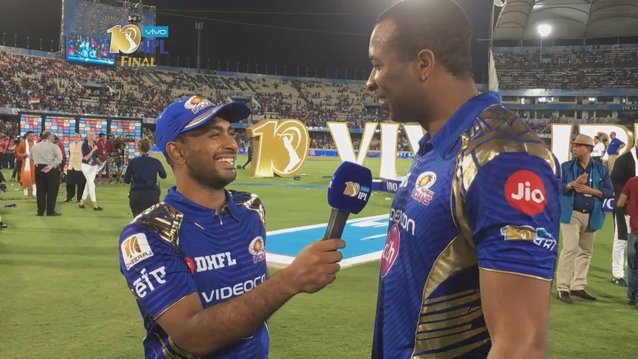 Kieron Pollard in conversation with Ambati Rayudu background