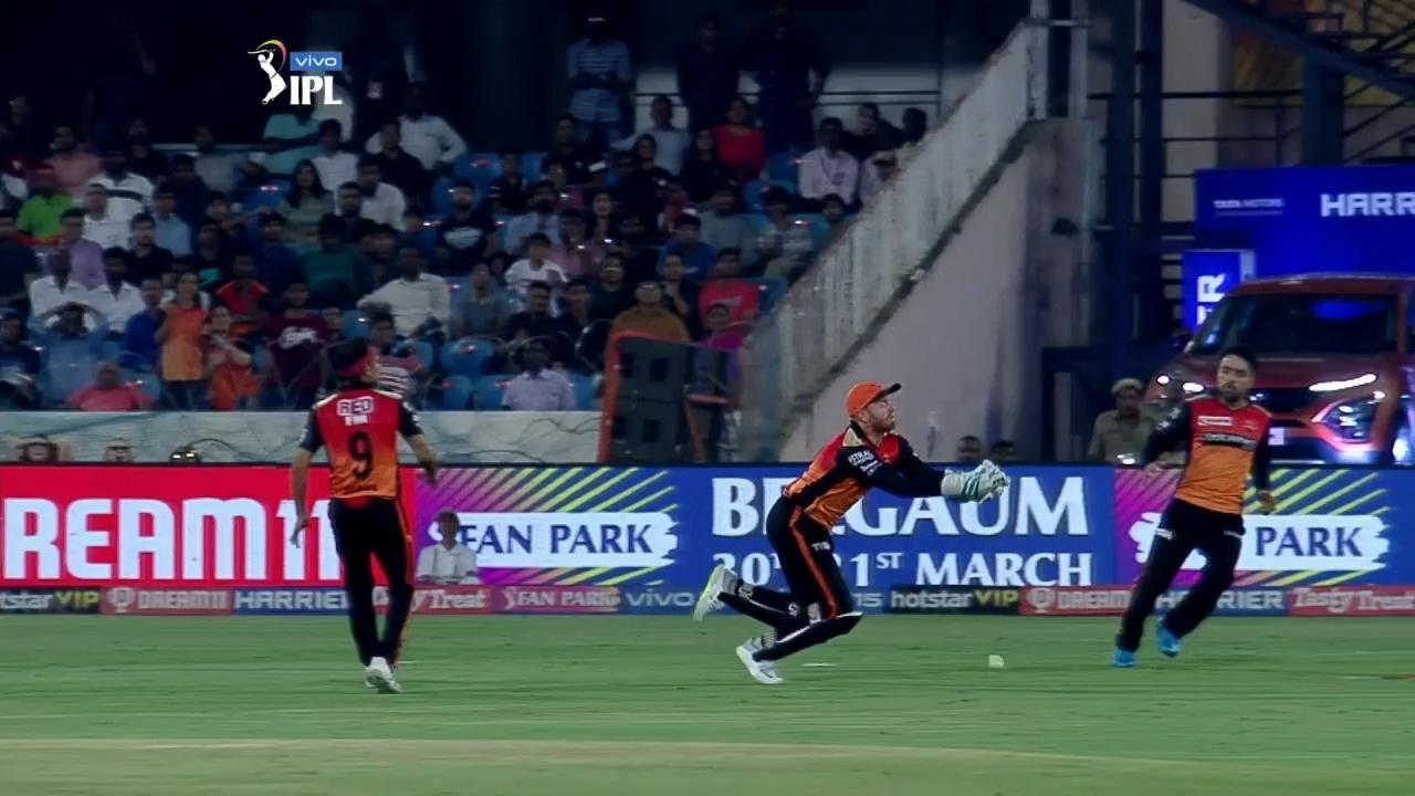 Three SRH players under a ball but they still drop background